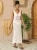 EDOLYNSA-2023-bia-a-szyde-kowa-tunika-Sexy-bez-r-kaw-w-Hollowing-sukienka-wyj-ciowa.jpg_-2.webp