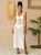 EDOLYNSA-2023-bia-a-szyde-kowa-tunika-Sexy-bez-r-kaw-w-Hollowing-sukienka-wyj-ciowa.jpg_.webp